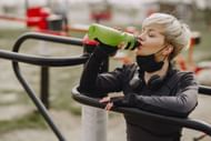 Pre-workout supplements might dehydrate you, so it's crucial to consume lots of water all day long. (Image via Pexels/Gustavo Fring)